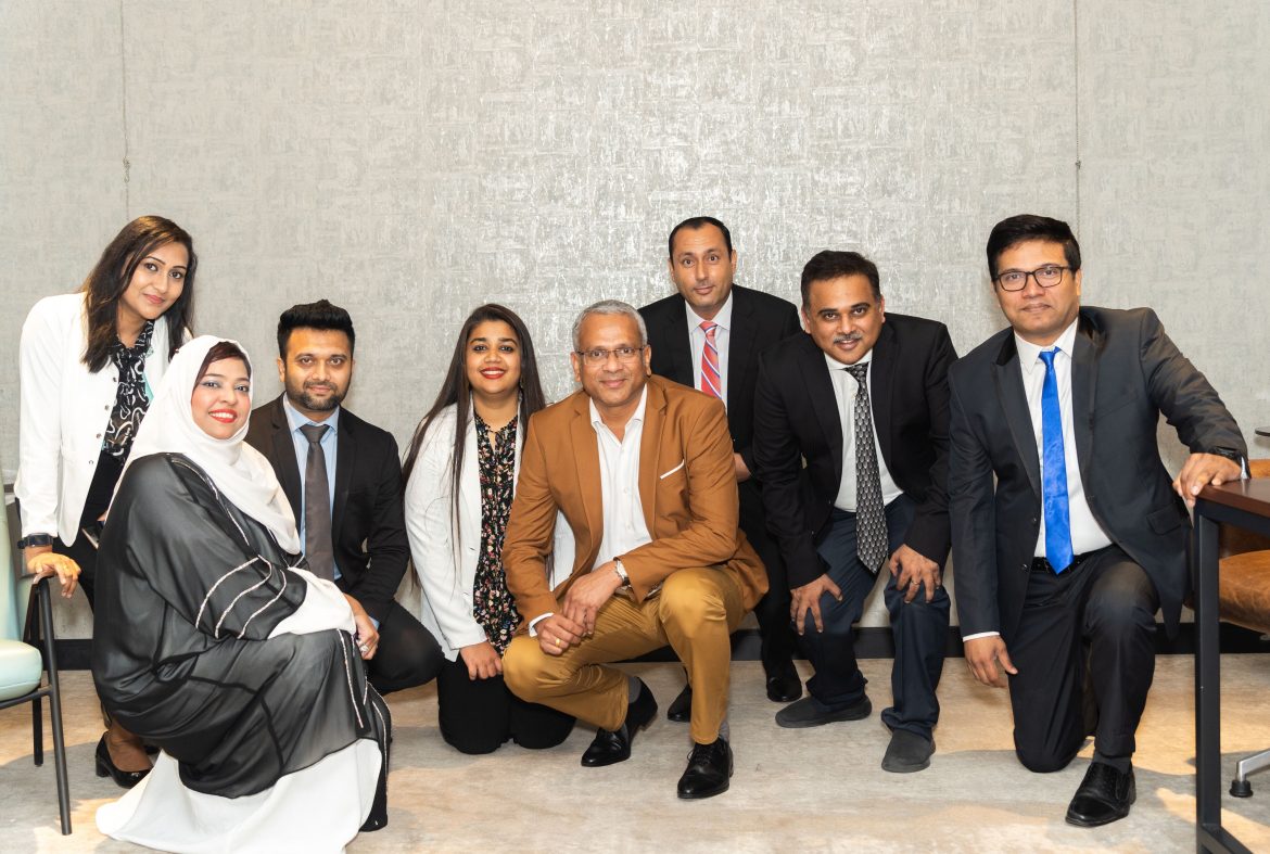 Pradeep Kumar, General Manager, ABCOM Distribution LLC, with Abcom Team